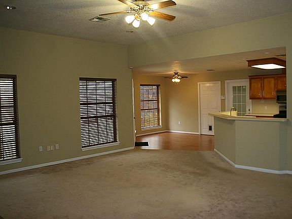 Open Floor Plan. Recessed Living Above the Kitchen Sink