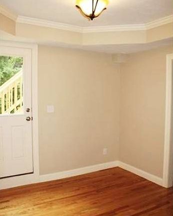 dining room with tray ceiling
