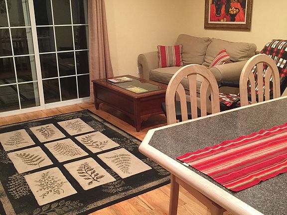 Living area with slider to patio