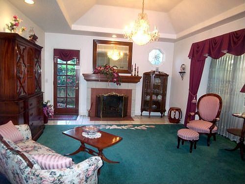 Formal living room with coffered ceilings