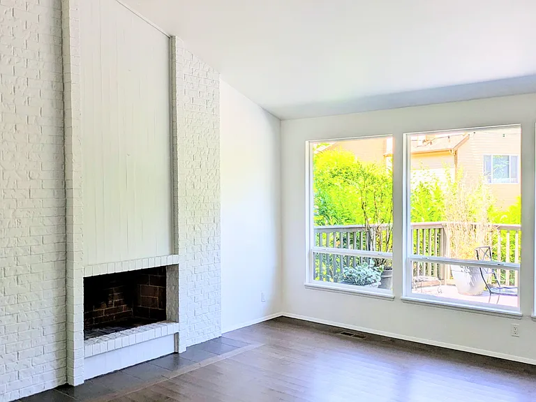 Living Room with cathedral ceilings and all new windows