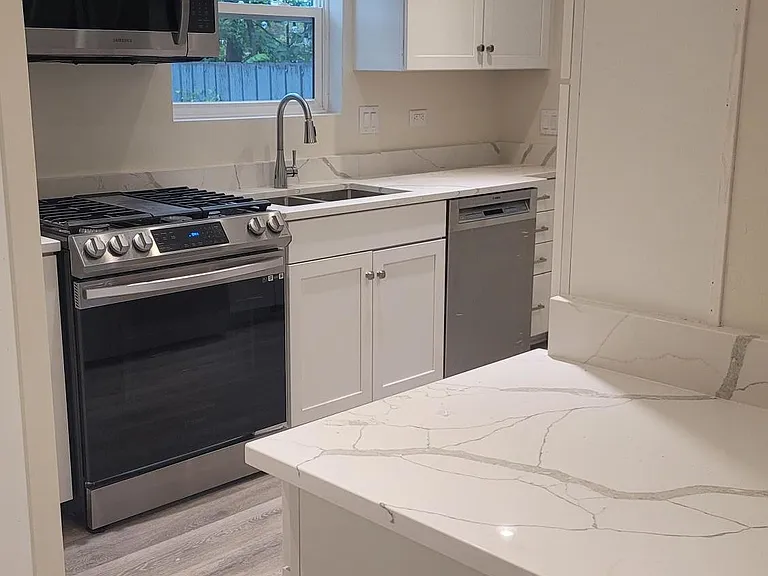 Remodeled kitchen with self-closing doors/drawers