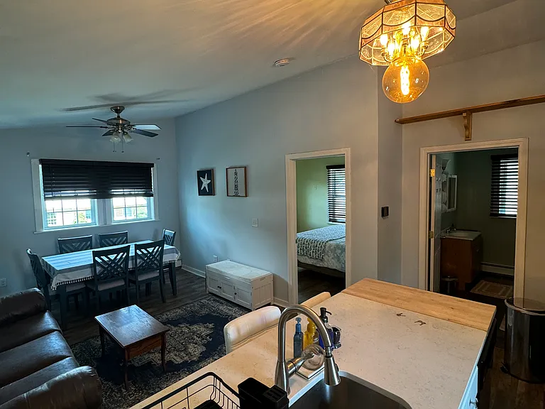 Kitchen sink and living room.