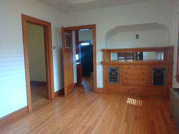 Dining room to kitchen and back bedroom