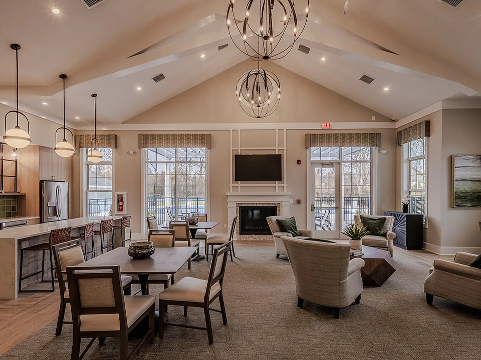 Welcome to Atlantic Manor Apartments, where elegance meets comfort. Our beautifully designed lounge area features high ceilings, modern lighting, and cozy seating, perfect for relaxation or social gatherings. Schedule your visit today!