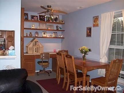 Dining room. : Dining room space next to living room space and adjacent kitchen.