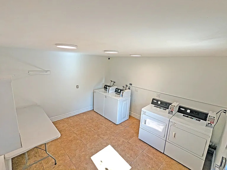 Clean Laundry room with restricted Access.