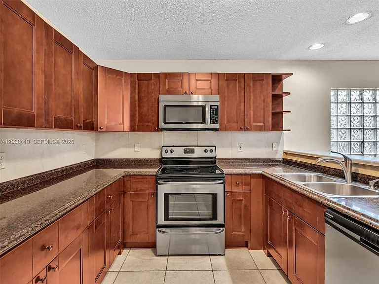 10731 NW 16th Ct — Photo 17