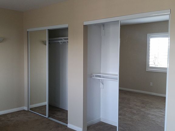 Double custom closets in master bedroom