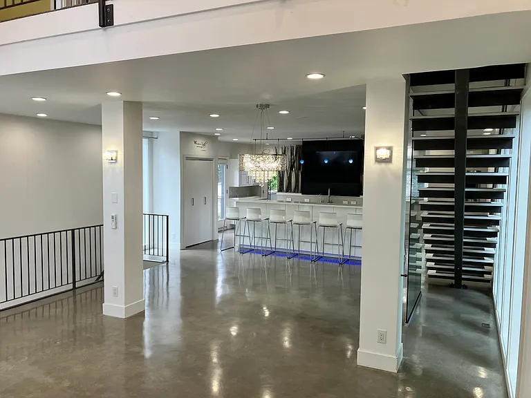 Main Floor looking North: heated concrete floors for year-round warmth without all the blowing air & dust of a furnace.
