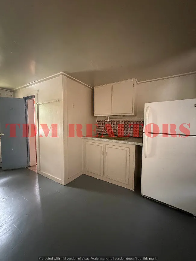 Building Photo - 10100 S Saginaw St #9