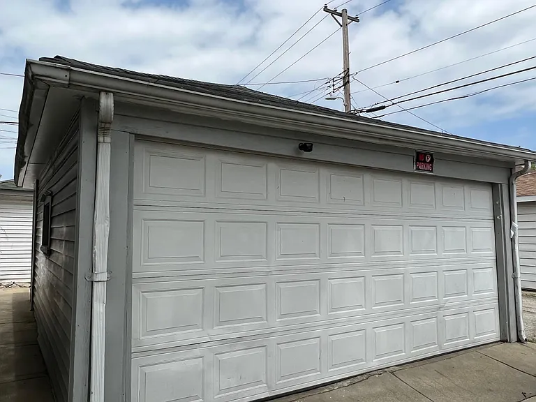 The east side of the garage (1 space) is included in the rent. A small amount of storage on that side can be utilized as well.
