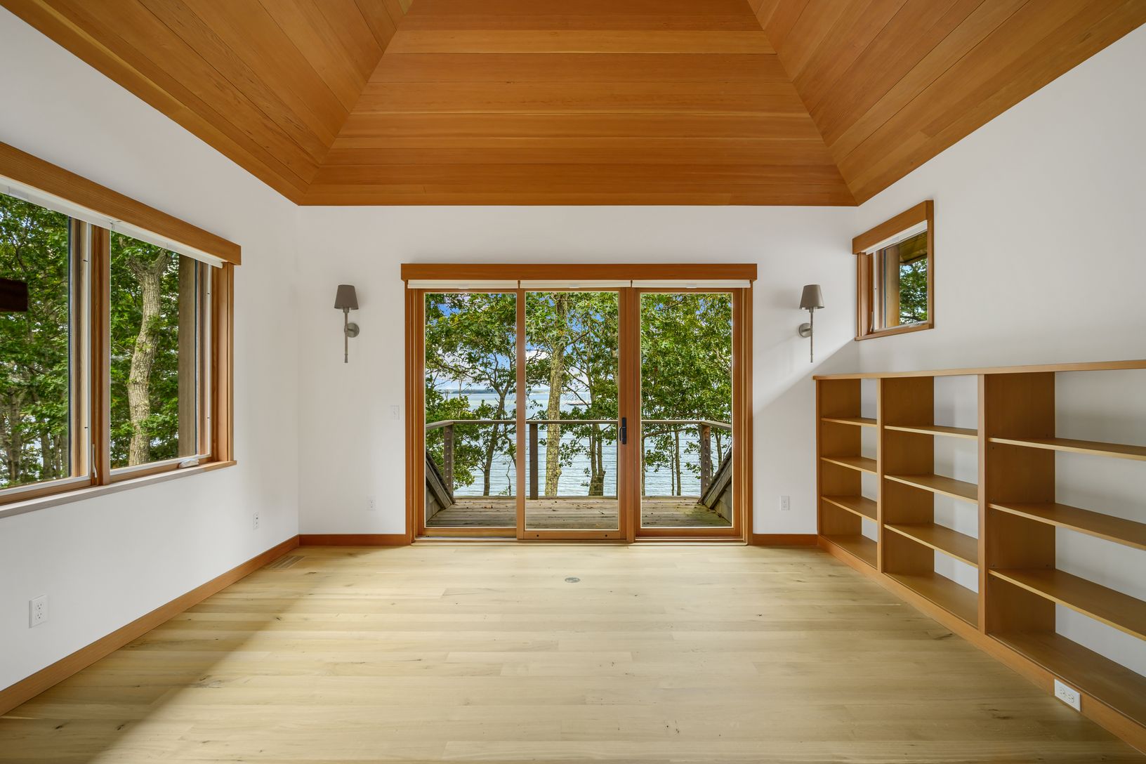  second floor, 3rd bedroom with built in shelves and cabinetry