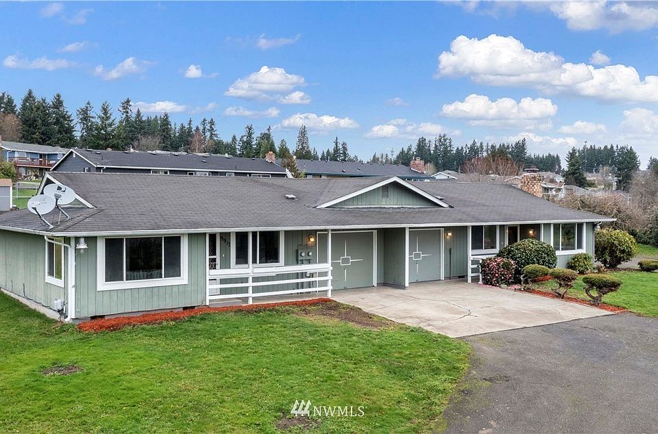 Set your sights a little bit higher on this Duplex! Situated on an elevate one acre parcel with incredible Mt. Rainier views! It is a perfect candidate for an owner occupied property! So much to offer!