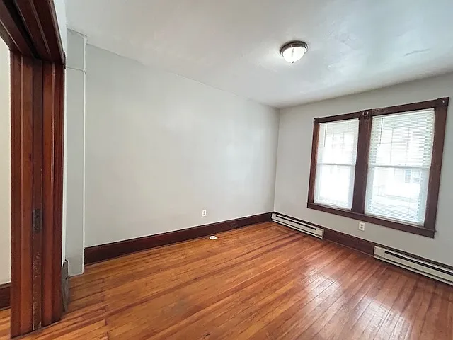Bedroom, windows overlook front porch