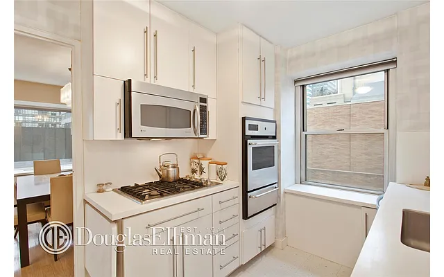 Sold by Douglas Elliman | media 18