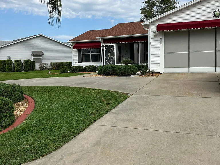 Half circle driveway-park 4 vehicles. 5 minute golf cart ride to Spanish Springs square. Garage stores 1 car and 1 golf cart