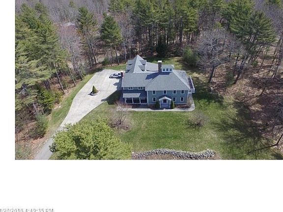 Custom drive, large 2 car garage. Very private setting close to Dock Square.