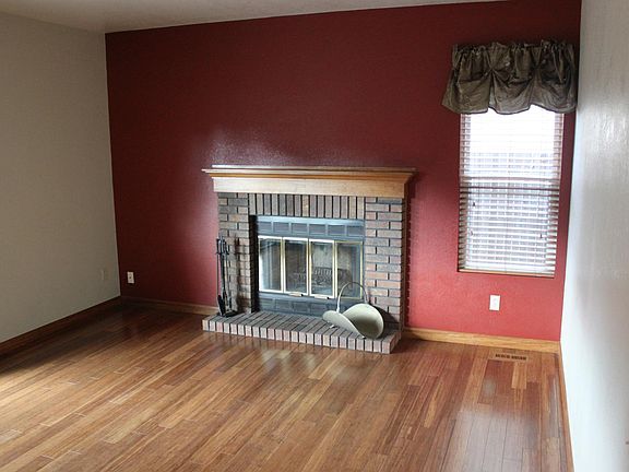 family area with wood fireplace