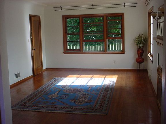 Hardwood floors, arched doorways