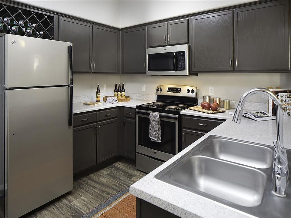 Silver appliances and updated cabinets in select homes are s