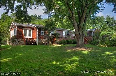 ALL CEDAR SIDED 1 LEVEL HOME W/ 3 DECKS. 6  ACRES