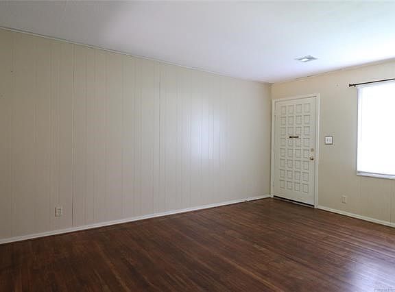 Living room from bedroom hallway.