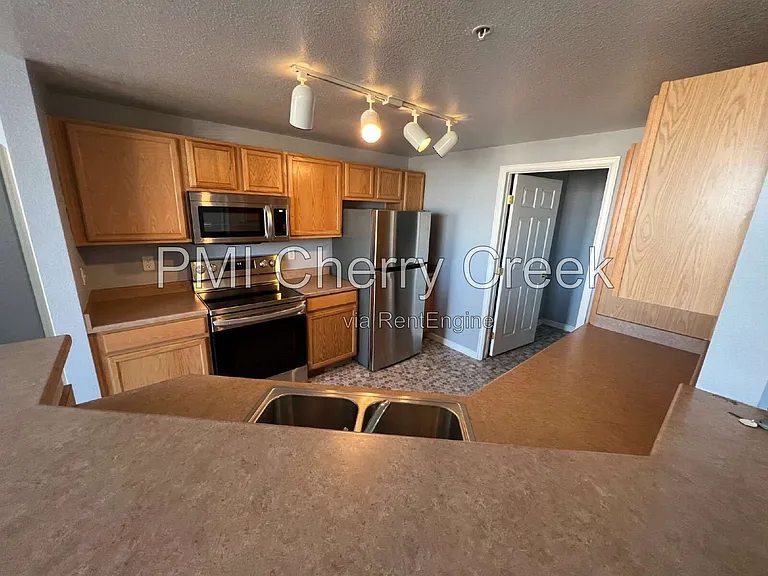 5705 N Genoa Way #208 — Photo 6
