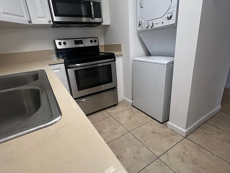 Washer and dryer inside the unit
