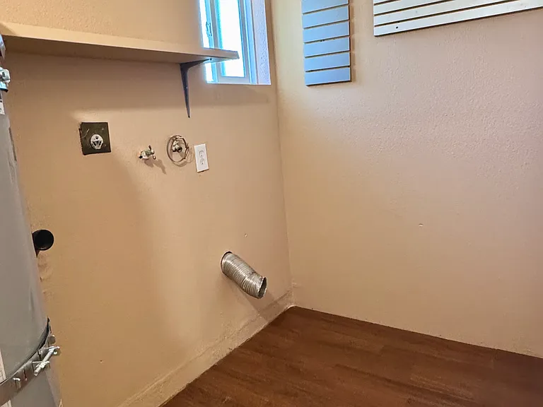 Space for washer and dryer.