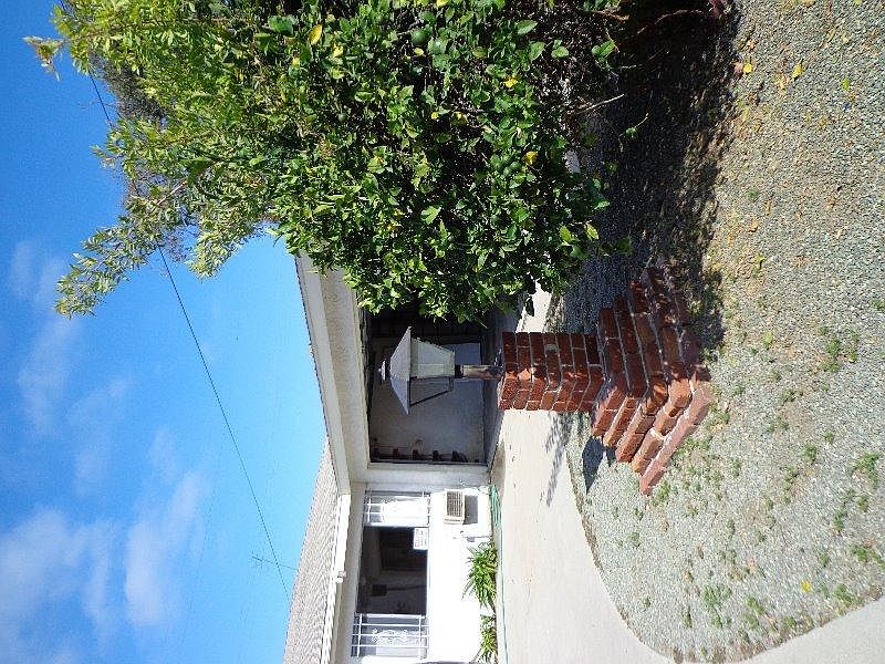 Front View House + Garage