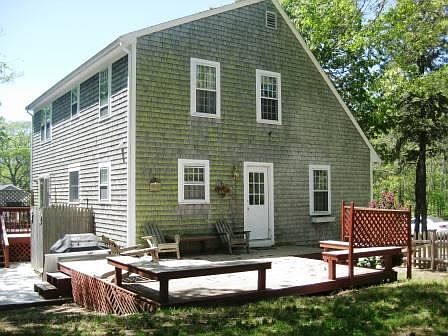 Deck with patio furniture and gas grill