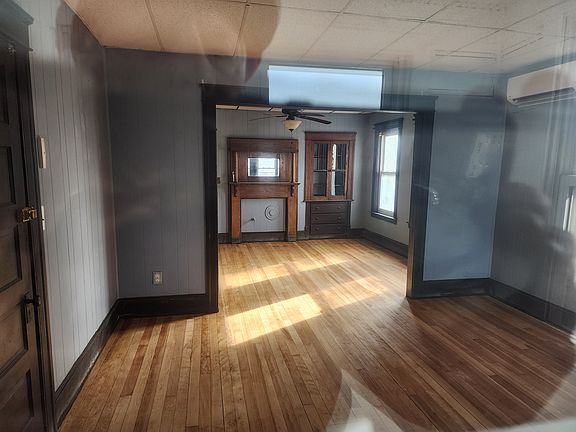 Living Room from Porch note the Period woodwork and built-ins.