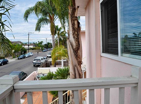 Your own private balcony facing toward the ocean, only one block from DP.