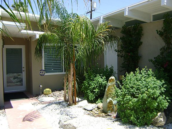 Inside private entry with fountain.