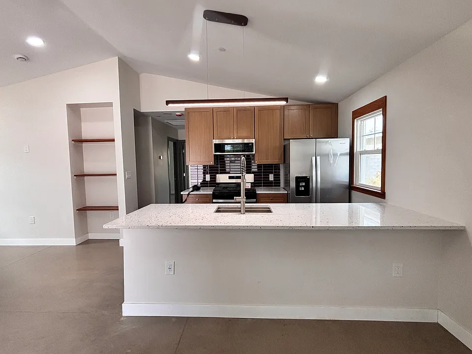 KITCHEN FROM DINING AREA