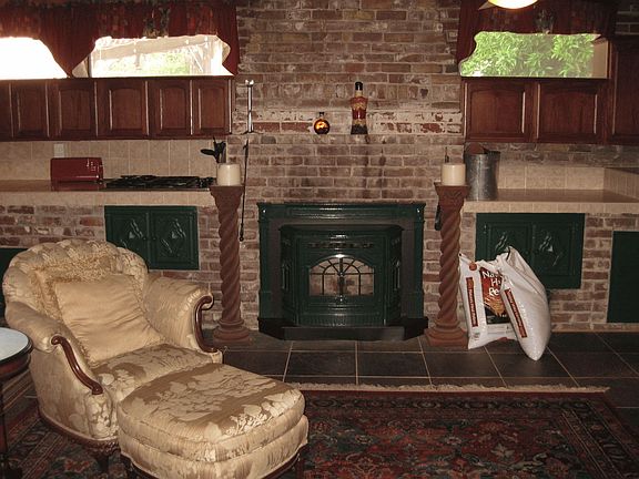 cozy sitting area by the fireplace