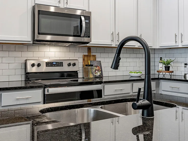 Experience culinary excellence in this sleek and modern kitchen space.