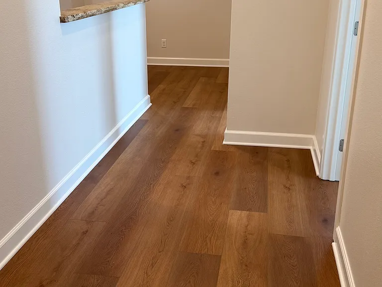 Hallway upstairs with laminate wood flooring