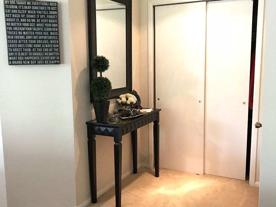 Bright entry way with large closet and storage space