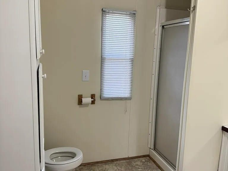 Bath with shower off of master