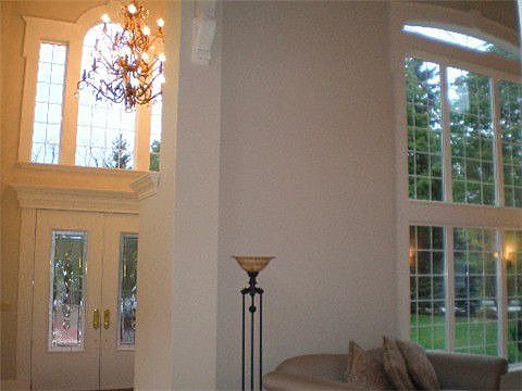 2 story foyer entry with limestone floors