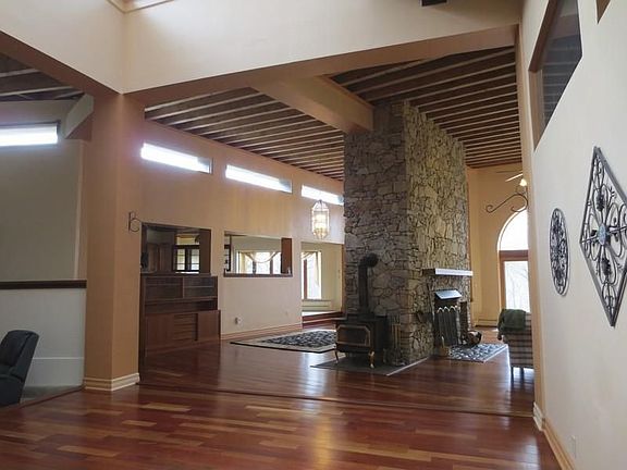 Family Room View to Dining Room and Living
        Room