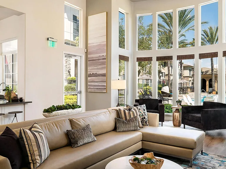 Bright Clubhouse Lounge Featuring Floor-To-Ceiling Windows