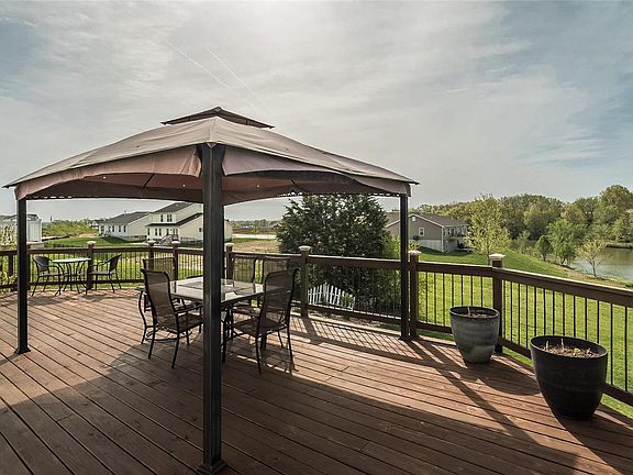 Freshly stained deck w/new solar light caps on rail