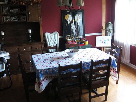 View of dining room from side hall entrance.