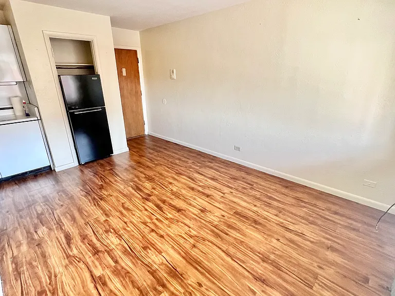 Step into a cozy, modern kitchen area fitted with essential appliances. Step into a cozy, modern kitchen area fitted with essential appliances.