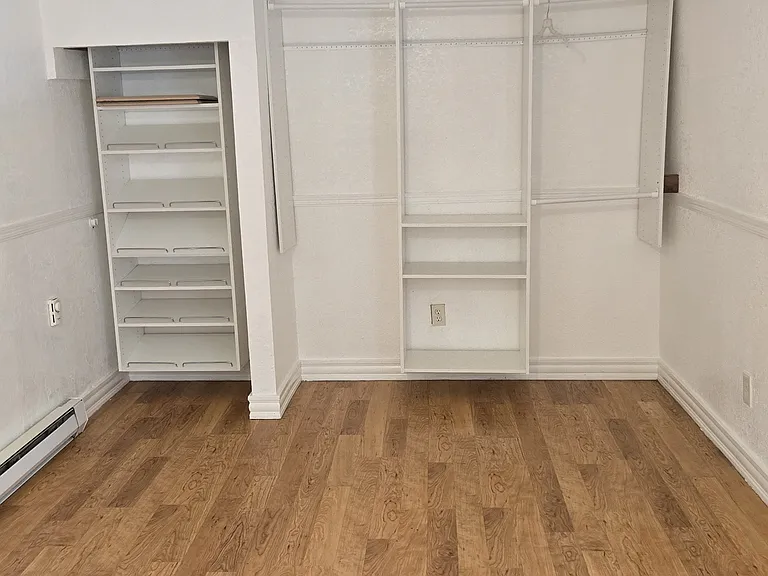 13' of double barred closet & shoe storage