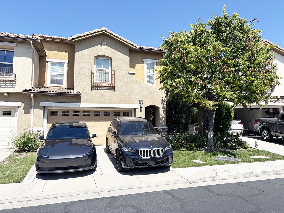 2-Car Attached Garage & Parking Spaces in Front