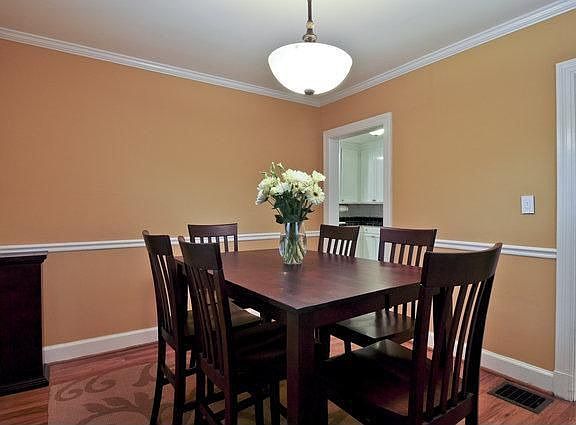 A separate formal dining room is just one of many unexpected spaces in this en